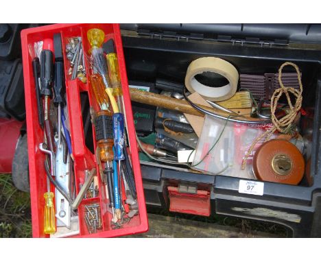 A tool storage stool and contents.