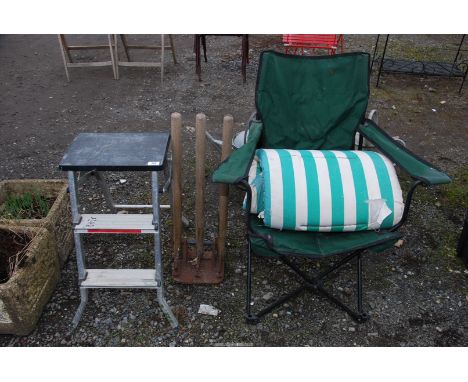 A Step stool, fishing chair and cricket stumps.