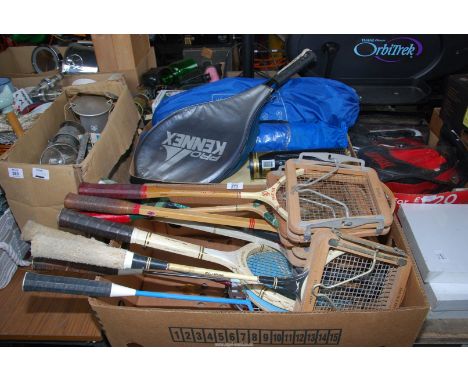 Three boxes of sporting equipment, racquets, balls, boxing gloves, etc.