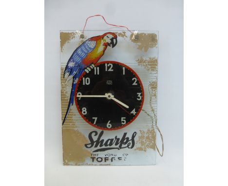 A rare Sharps Toffee pictorial Sectric glass rectangular wall clock, 12 x 17".