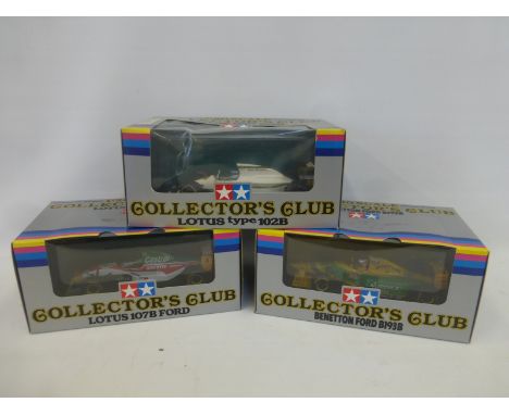 Three boxed 1:20 scale Collector's Club Formula 1 cars - a Lotus 107B Ford, a Lotus Type 102B and a Benetton Ford B193B.