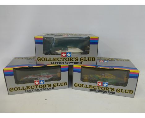 Three boxed 1:20 scale Collector's Club Formula 1 cars - a Lotus 107B Ford, a Lotus Type 102B and a Benetton Ford B193B.