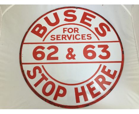 A 'Buses Stop Here for Services 62 and 63' circular double sided red and white enamel sign, in excellent condition, 20" diame