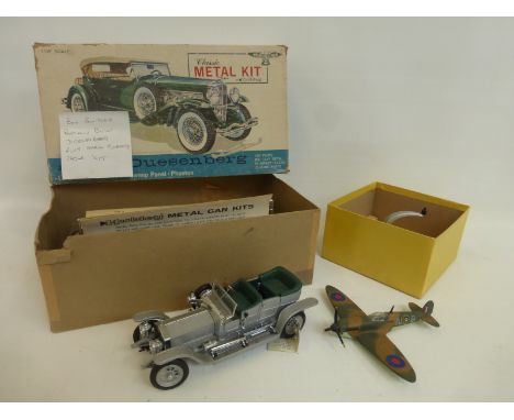 A Hubley Classic metal model SJ Duesenberg and a Dinky MKII Spitfire.