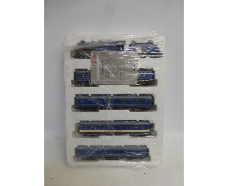 A Bachmann 00 gauge boxed set, comprising the Royal Scot 46100 engine and tender, three passenger coaches and a Royal coach. 