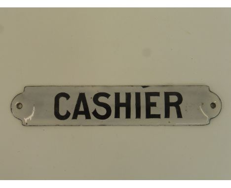 A small enamel convex door plaque for "Cashier", 8 x 1 1/2".