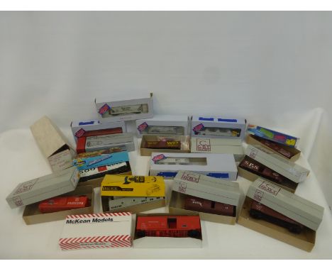 An assortment of boxed H0 scale American freight rolling stock by various makers.