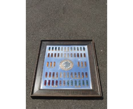 A Kynoch Ammunition pictorial advertising mirror, in original frame, stamped.