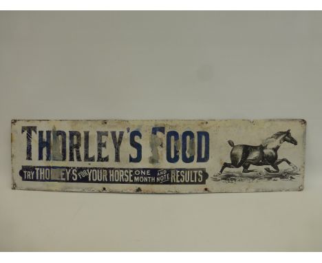 A Thorley's Food part pictorial enamel sign with an image of a prancing horse to one end, 33 x 8".