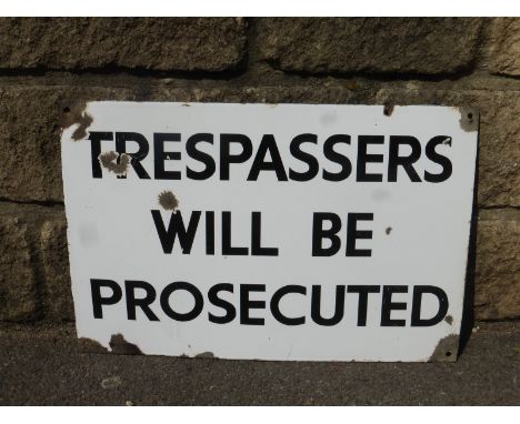 A rectangular enamel sign- "Trespassers will be Prosecuted", 18 x 12".