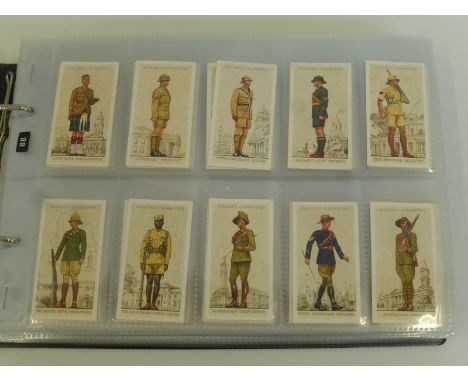 An album of assorted cigarette collector's cards including John Player Military Uniforms, Tennis, W.D and H.O. Wills - Associ
