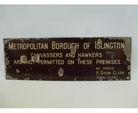 A Metropolitan Borough of Islington rectangular brown and cream enamel sign, 18 x 6".