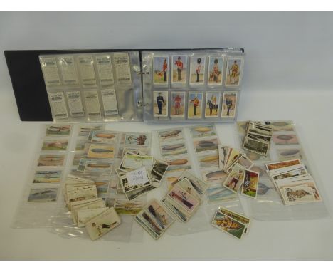 An album of assorted cigarette collector's cards including Wills - Allied Army Leaders, B. Muratti, Sons & Co. - Australian R