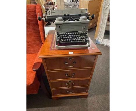 Yew two drawer filing cabinet, vintage Imperial typewriter and brass fender (2).