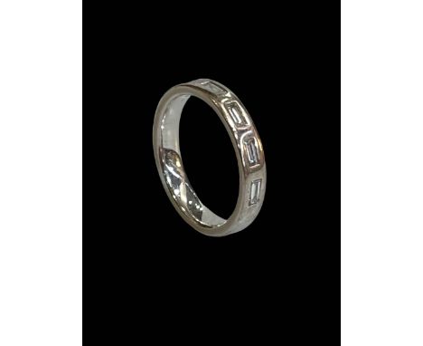 Diamond baguette 18 carat white gold half eternity ring, size M.