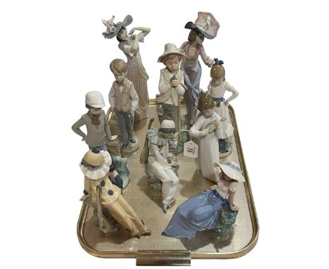 Four Lladro and six Nao figurines.