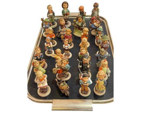 Collection of twenty eight Hummel figures.