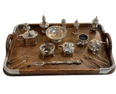 Collection of silver condiments, four sets of tongs, pickle fork, etc.