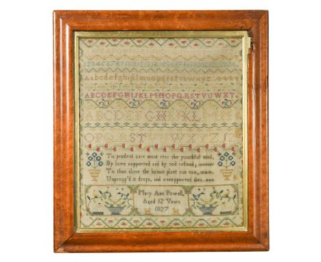A George IV needlework sampler, dated 1827, by Mary Ann Powell, aged 12 years, worked with the alphabet, numbers and verse, w