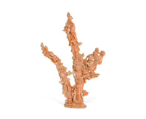 A Chinese three branched figural coral ornament, Qing Dynasty, late 19th century, from a single piece, worked with five mythi