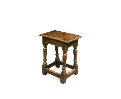 An oak joint stool, late 17th century, the plain frieze with reeded edge, on turned supports united by stretchers48 x 41 x 23