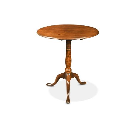 A George III mahogany and elm tripod table, the circular mahogany tilt-top raised on a well-figured, slender baluster elm ste