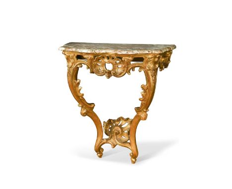 A Rococo style carved giltwood console table, 19th century, the red and white variegated marble top of serpentine form on a p