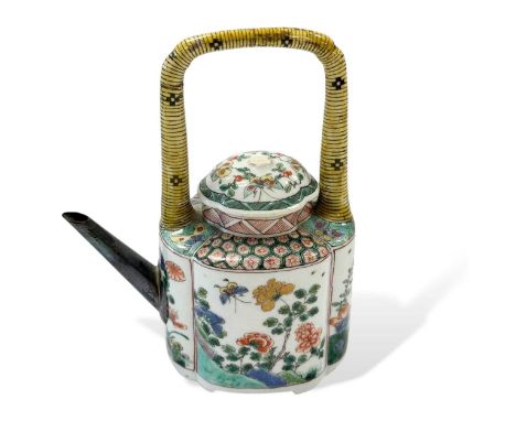 A Chinese famille verte porcelain wine pot and cover, Kangxi Emperor (1662-1722), with lobed body and integral faux woven ove