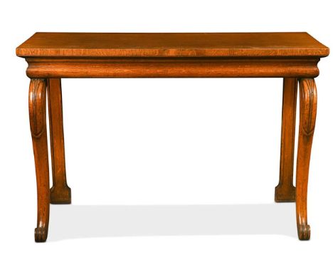 A William IV oak console table, the rectangular top on cabriole front legs with scrolled feet and silhouetted back legs83 x 1