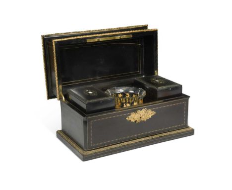 A French gilt metal mounted ebonised tea caddy, 19th century, opening to reveal two mother-of-pearl inlaid cannisters within 