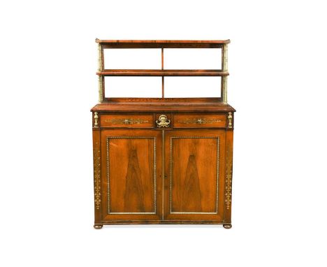 A Regency rosewood brass inlaid chiffonier, three shelves with mirrored backs below a brass gallery with pierced brass sides,