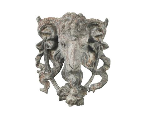 A cast lead garden wall appliqué or fountain mask, 20th century, the central ram's head mask festooned with ribbon swags and 