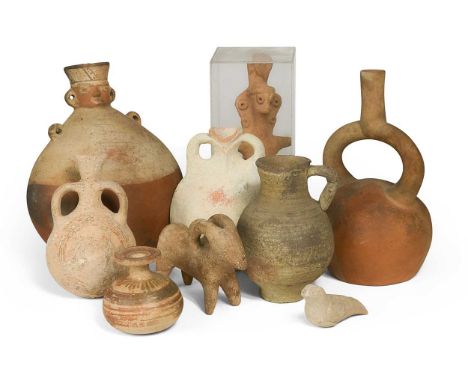 A group of ancient terracotta and other vessels and objects, including a Syro-Hittite goddess figure, a pre-Columbian vessel 