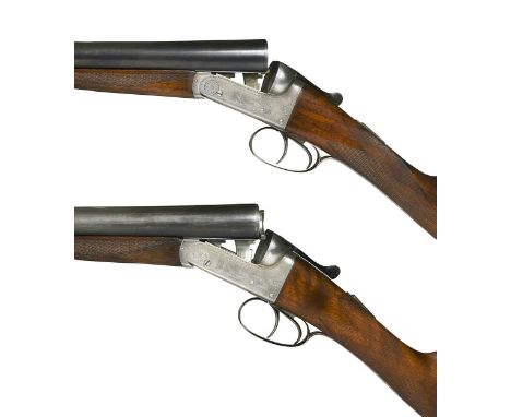 Vickers, a composed pair of 12 bore boxlock ejector guns, Nos. 5563 and 5576,  each with 26" barrels, the frames with game sc