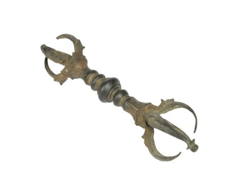 A Javan bronze vajra, probably 8th-10th century, with multiple knopped stem and claws terminating in stylised bird heads27cm 