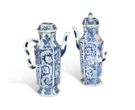 A pair of Chinese blue and white export porcelain vinegar jugs and covers, Kangxi Emperor (1662-1722),  each octagonal panell