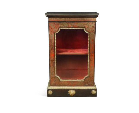 A boulle work pier cabinet, 19th century, the slate top over a single glazed door with tortoiseshell and cut brass inlaid dec