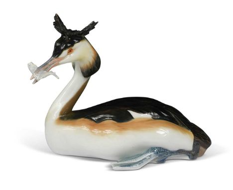 A Meissen porcelain model of a Great Crested Grebe, early 20th century, naturalistically modelled with its head to one side, 