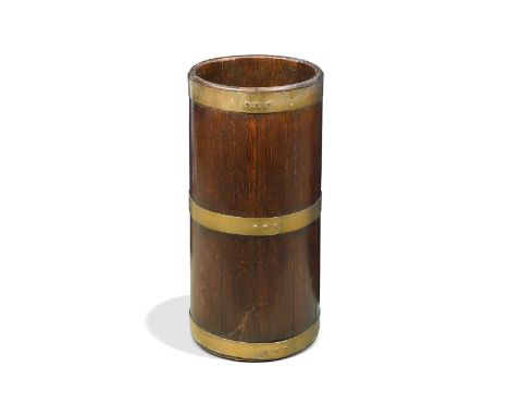 An Edwardian coopered-oak umbrella and stick stand, of simple cylindrical form with three bands in brass62 x 29cmExcellent or