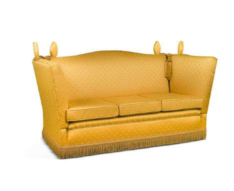 A Knole type three seat sofa, modern, upholstered in gold patterned material, with drop ends and bullion fringe106 x 172 x 83