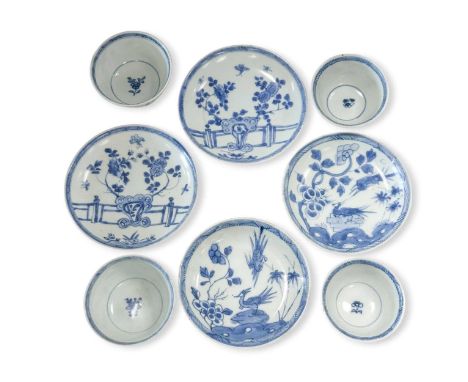 Four Chinese export blue and white tea bowls and saucers from the Ca Mau cargo, 18th century, decorated with flowers and rive