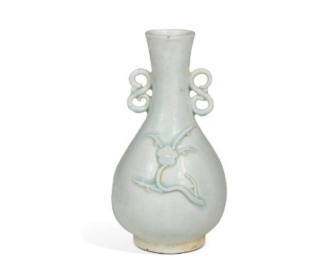 A Chinese Qingbai ware plum blossom vase, Southern Song/Yuan (1279-1368), probably circa 1320, with applied S scroll handles,