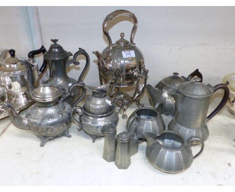 A silver plated spirit kettle; an EPBM 4 piece tea set; a beaten pewter tea set; etc.