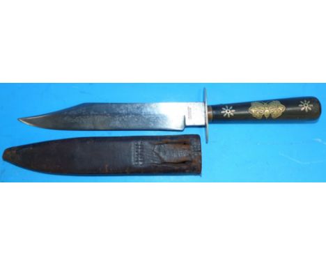 A hunting knife with brass inlaid horn handle and leather scabbard, length 13"