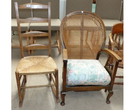 A 1930's ladder back rocking/nursing chair; a 1930's cane back armchair