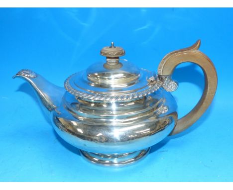 A silver teapot with wooden handle and finial, 21.7 oz. (marks worn; some repairs)