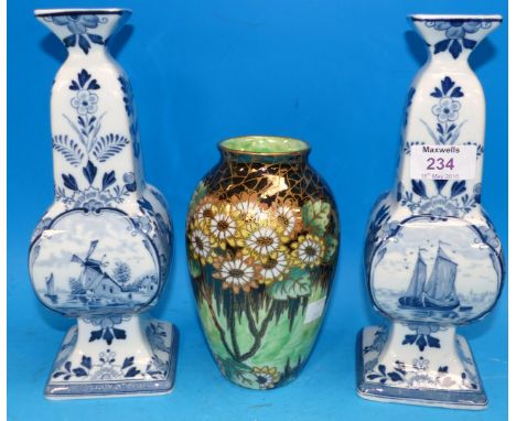 A 1930's Maling green lustre vase; a pair of modern Delftware square baluster vases
