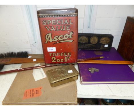 Two WWI tins; a whistle; a swagger stick and other collectables