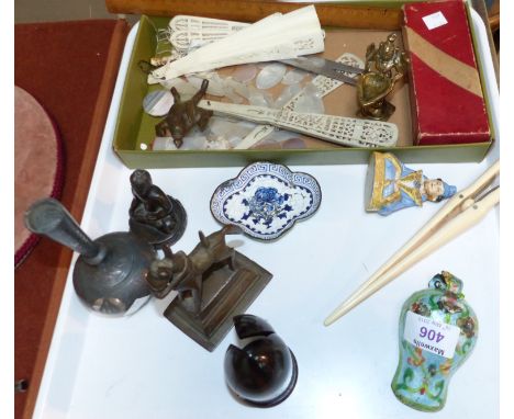 A collection of miniature eastern bronze figures; mother-of-pearl counters; other collectables