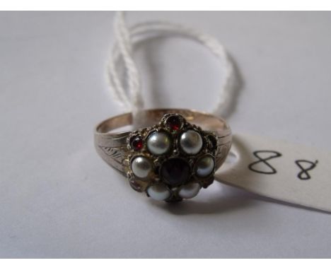 An unusual antique pearl and garnet   9ct cluster ring with silver mounts      